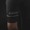 A man wearing a black shirt with the AVENTON HIGHSNOBIETY JERSEY on it, showcasing e-bikes accessories.
