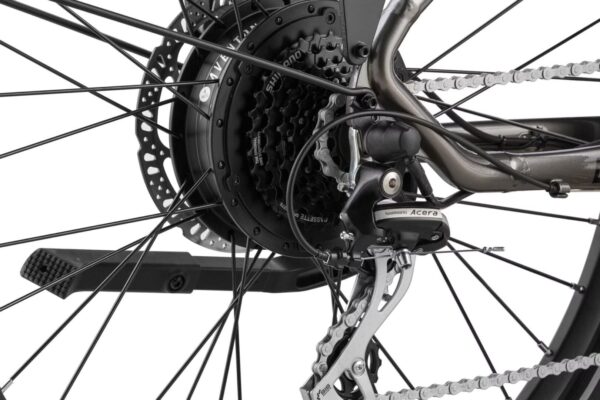 A close up of a LEVEL.2 Commuter Ebike with a chain and gears.