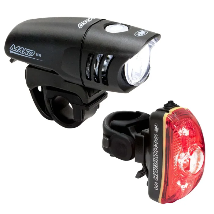 An innovative NITERIDER MAKO 250 HEADLIGHT AND CHERRYBOMB 100 TAILLIGHT COMBO that features a red light and a black light, perfect for enhancing visibility and safety during biking adventures.