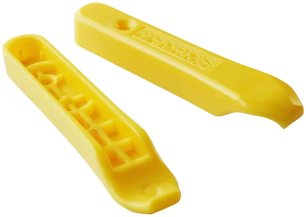 Two PEDRO'S MICRO LEVER PAIR, YELLOW plastic handles on a white background, suitable for e-bikes accessories.