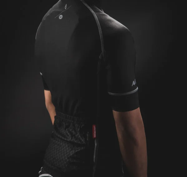 The back of a man wearing the AVENTON HIGHSNOBIETY JERSEY showcasing ebikes and e-bikes accessories.