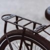 A close up of a bicycle with the AVENTON REAR RACK - PACE 350 / PACE 500 on it, showcasing ebikes accessories.