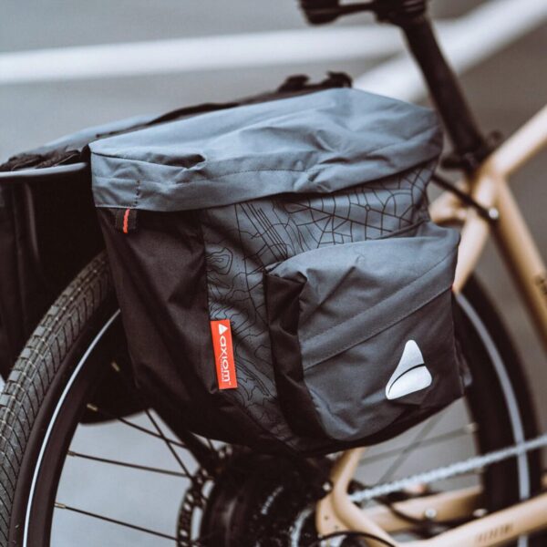 An ebike with an AVENTON REAR RACK - PACE 350 / PACE 500 attached to it, perfect for Babyboomerbikes enthusiasts in WA, USA.