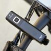 An AVENTON HEAD LIGHT V10-500 attached to the handlebar of an ebike.