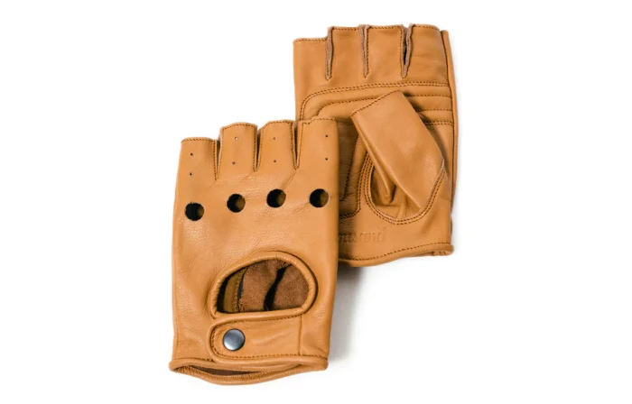 A pair of Thousand Bullitt gloves with holes, perfect for USA e-bike enthusiasts.