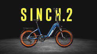 A blue bicycle with the words sinch 2 on it, suitable for USA riders.