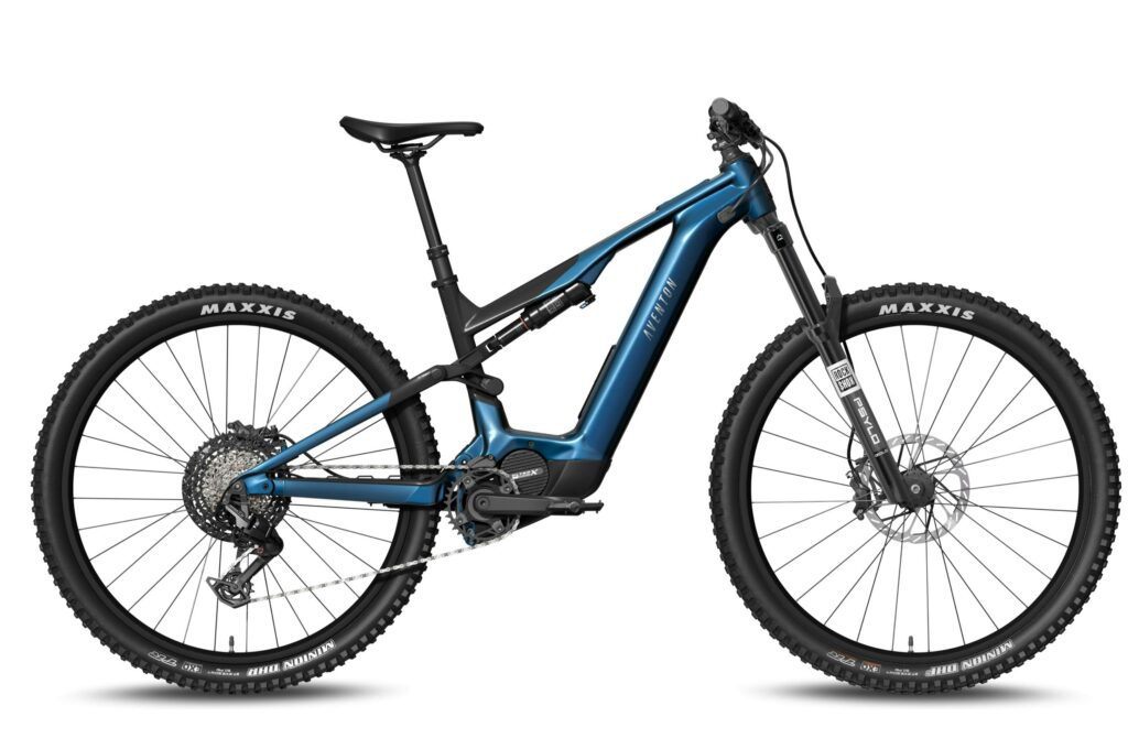 A blue full-suspension electric mountain bike with a sloping top tube, Maxxis tires, and a mid-drive motor.