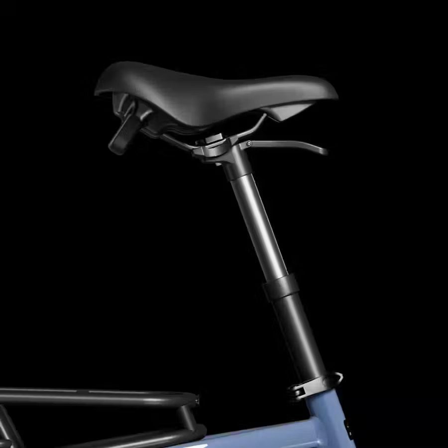 A blue bicycle with a black seat and handlebars, perfect for Babyboomerbikes enthusiasts.