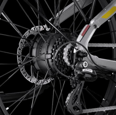 A close up of a bicycle with a chain and gears, showcasing USA-made accessories for e-bikes.