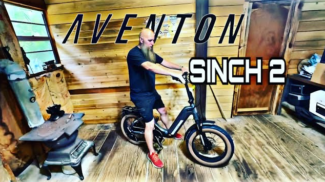 A man riding an electric bike with the words aventon sinch 2, showcasing Ebikes and e-bikes accessories.