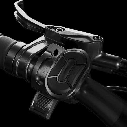 A close-up of the handlebar of an e-bike.