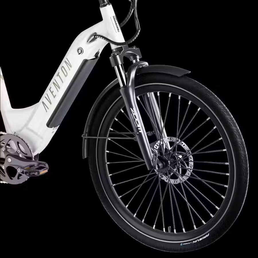 A white electric bike is shown against a black background in WA.