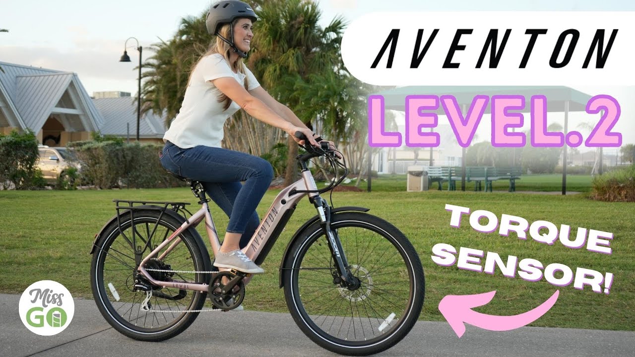 A woman riding a aventon level 2 torque sensor bike.