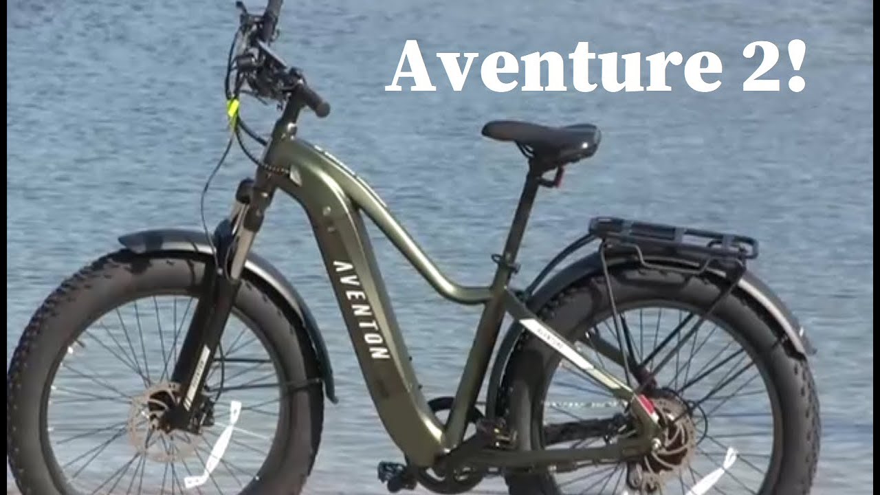 An electric bike with the words adventure 2 on it. This e-bike is perfect for any adventure-loving individual. Whether you're exploring the beautiful landscapes of WA, USA or cruising around town,