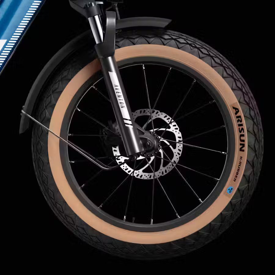 A close up of the front wheel of an electric bike, showcasing e-bikes accessories.