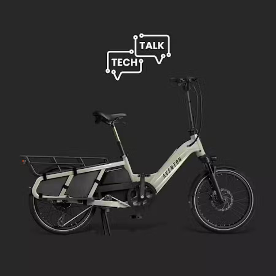 An electric bike with the words talk tech on it, perfect for tech-savvy riders or those looking for innovative transportation options.