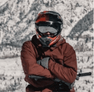 A man wearing a ski helmet.