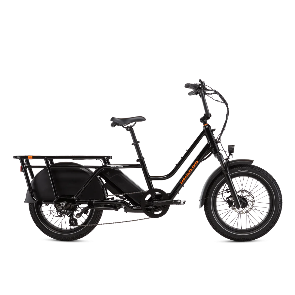 A black electric cargo bicycle with a sturdy frame, thick tires, and a rear rack designed for carrying loads. The bike features a step-through frame, wide handlebars, and disc brakes.