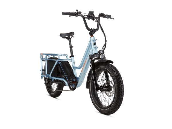 A light blue electric cargo bike with thick tires and a rear storage rack is shown on a white background.