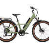 A green electric bicycle with a rear cargo rack, front suspension fork, and thick tires, displayed on a white background.