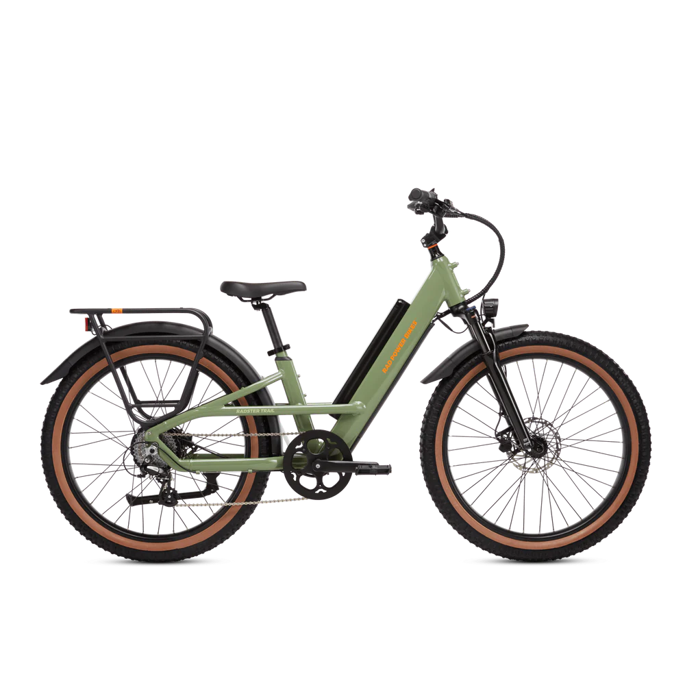 A green electric bike with a sleek frame, black handlebars, and orange accents. It features wide tires, a rear rack, and a front suspension fork.