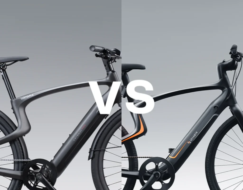 Two bicycles side-by-side for comparison, with "VS" in large white letters between them. Both are modern, sleek designs with a grey color scheme.