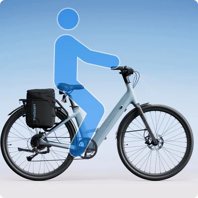 Illustrated figure riding a gray electric bicycle with a black rear cargo bag against a light blue background.