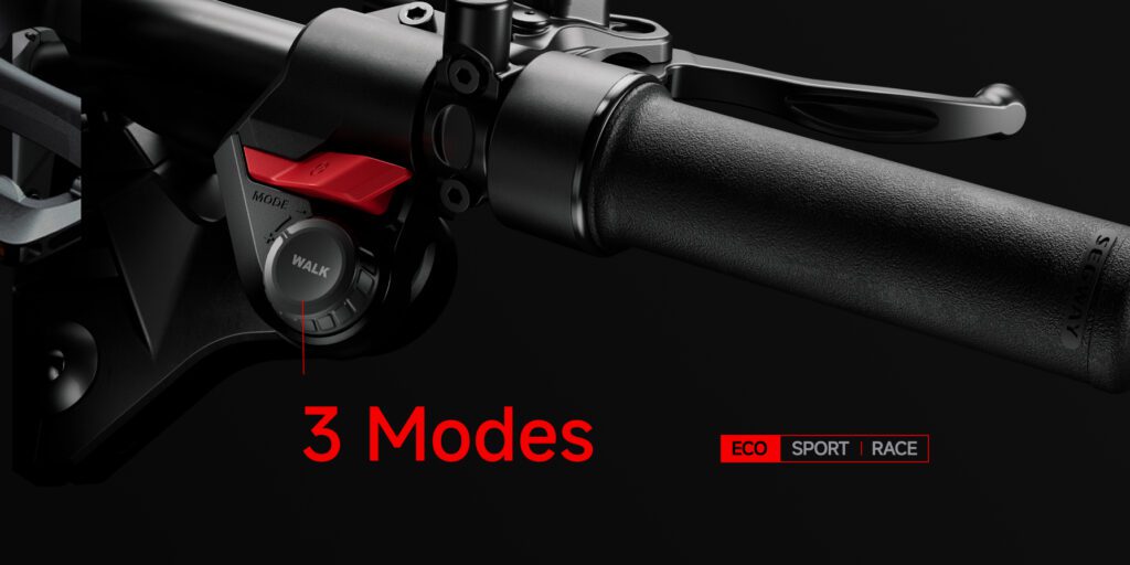 Close-up of a motorcycle or e-bike handlebar showing a mode selector switch with three options: ECO, SPORT, and RACE. Text indicates "3 Modes" and highlights the options.