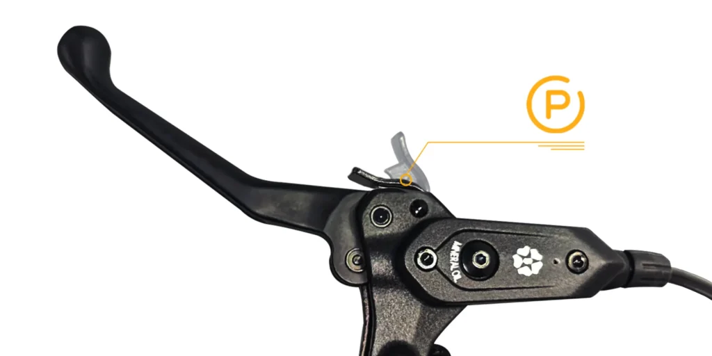 Close-up of a black bicycle brake lever with an orange "P" symbol highlighting a specific adjustment screw.