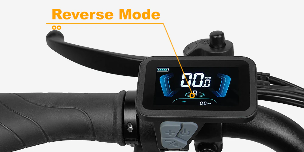 Close-up of an e-bike handlebar display showing "Reverse Mode" highlighted on the screen, with speed and control buttons visible.