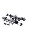 The NV™ 2.0 is a foldable metal bike rack with black and silver parts, designed for mounting on your vehicle.