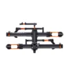 A black and orange hitch-mounted bike rack with two parallel trays for holding bicycles, viewed from the front against a white background.