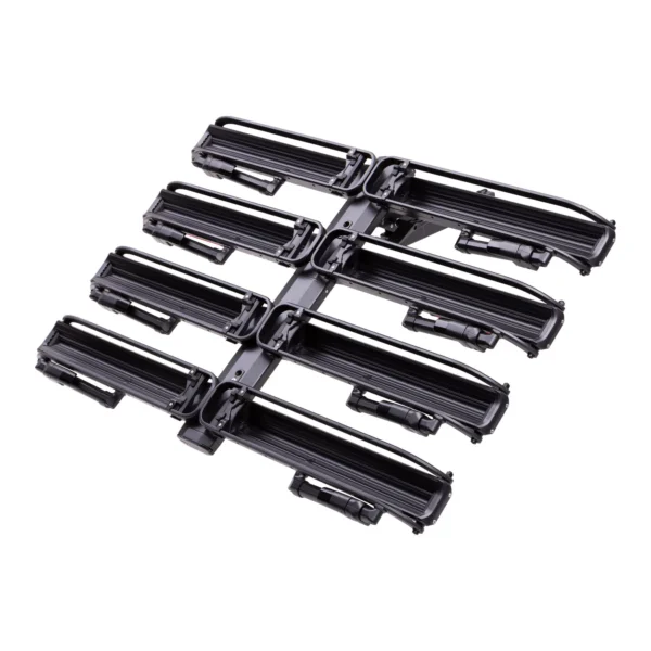 The NV™ 2.0 Add-On is a black, multi-slot roof rack attachment designed to carry several pairs of skis or snowboards side by side.