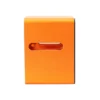 The Rack Dock is a rectangular orange metal object featuring a horizontal slot and a small round hole beside the slot on its front face.