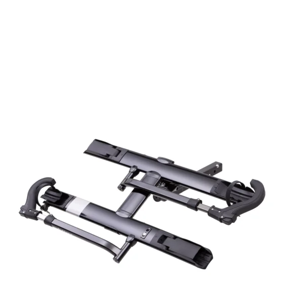 The Sherpa™ 2.0, a black and silver platform-style hitch bike rack, is shown on a white background in its folded position for storage or transport.
