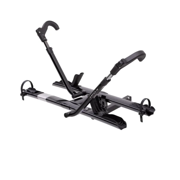 The Sherpa™ 2.0 is a black and silver bike rack with adjustable arms and wheel straps, designed to mount on your vehicle roof or hitch for transporting one bicycle.