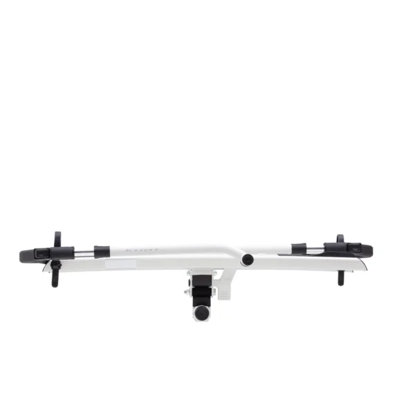 The Sherpa™ 2.0 is a silver, horizontal bike rack with black mounting straps, shown from the rear and designed to attach to your vehicle's hitch.