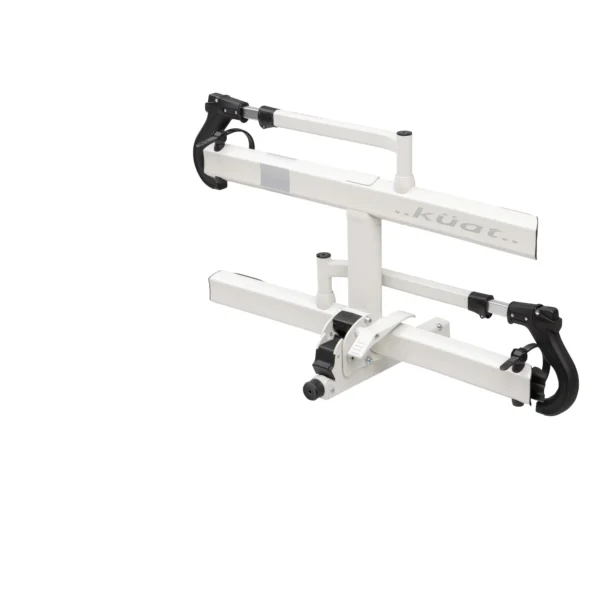 The Sherpa™ 2.0 is a white Küat bike rack with two wheel cradles and adjustable arms, made for mounting on a vehicle hitch.