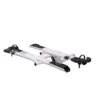 The Sherpa™ 2.0 is a white and black bicycle rack with two wheel trays and adjustable arms, designed for mounting on a vehicle.