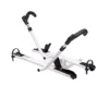 The Sherpa™ 2.0 is a white and black bike rack for vehicles, featuring adjustable arms and wheel holders for secure mounting.