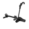 The Transfer™ v2 is a black, single-bike roof rack with an upright support arm and wheel holder, designed for mounting your bike on a vehicle roof.