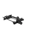 A black Transfer™ v2 bicycle rack, folded and resting on a white background.