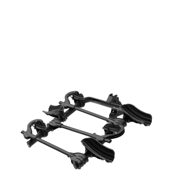Transfer™ v2 black metal and plastic car rack components arranged on a white background, viewed from an angle.