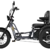 The Meet One Tour Lite Full Suspension Electric Trike is a three-wheeled e-trike featuring a sturdy frame, full suspension, large tires, high handlebars, and a cushioned seat with backrest for comfortable personal mobility.