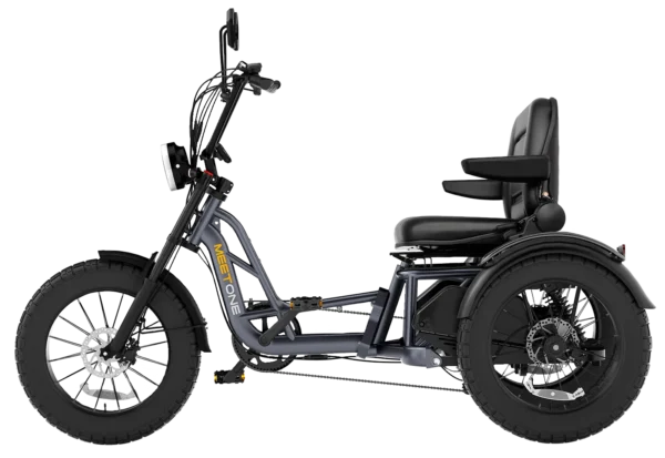 The Meet One Tour Lite Full Suspension Electric Trike is a three-wheeled e-trike featuring a sturdy frame, full suspension, large tires, high handlebars, and a cushioned seat with backrest for comfortable personal mobility.