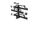 The NV™ 2.0 is a black metal bike rack with four mounting trays and "Küat" branding, designed to hold bicycles, shown against a white background.