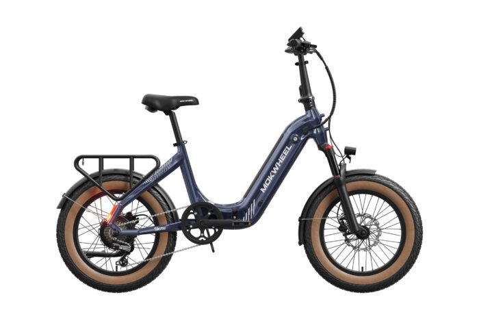 A blue step-through electric bicycle with wide tan tires, a rear cargo rack, front and rear fenders, and a front light, shown from the side on a white background.