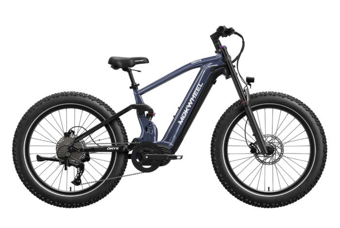 A dark blue electric mountain bike with thick tires, disc brakes, and a mid-drive motor, viewed from the side against a white background.