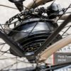 Close-up of the Asphalt Ebike’s rear hub motor featuring "MIKIMHEEL" branding and a label indicating peak power of 860W.