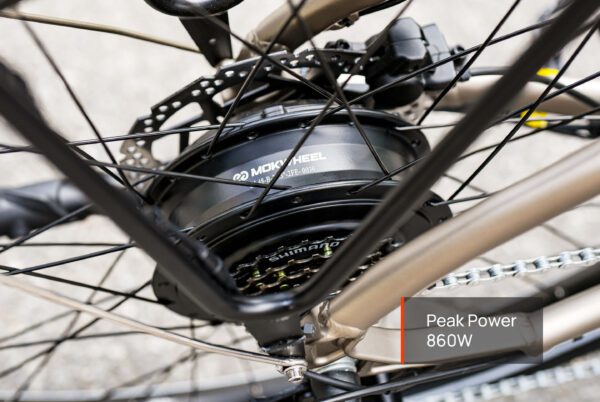 Close-up of the Asphalt Ebike’s rear hub motor featuring "MIKIMHEEL" branding and a label indicating peak power of 860W.